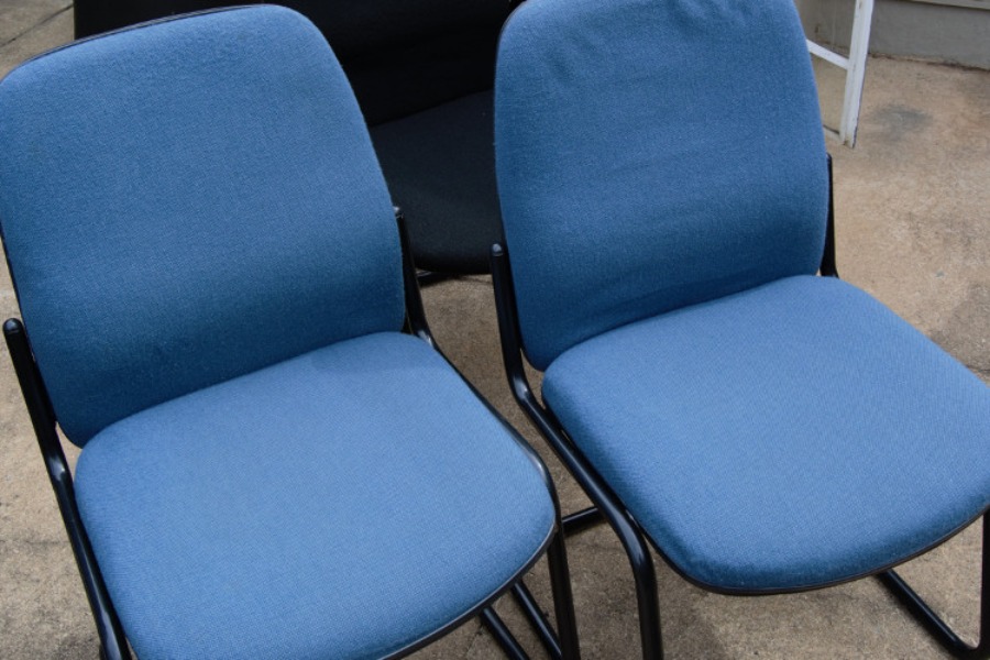 2 blue office chairs